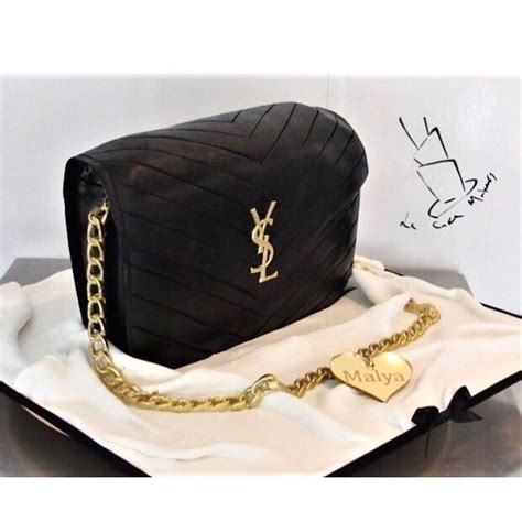 Yves Saint Laurent purse cake with custom acrylic heart made by 